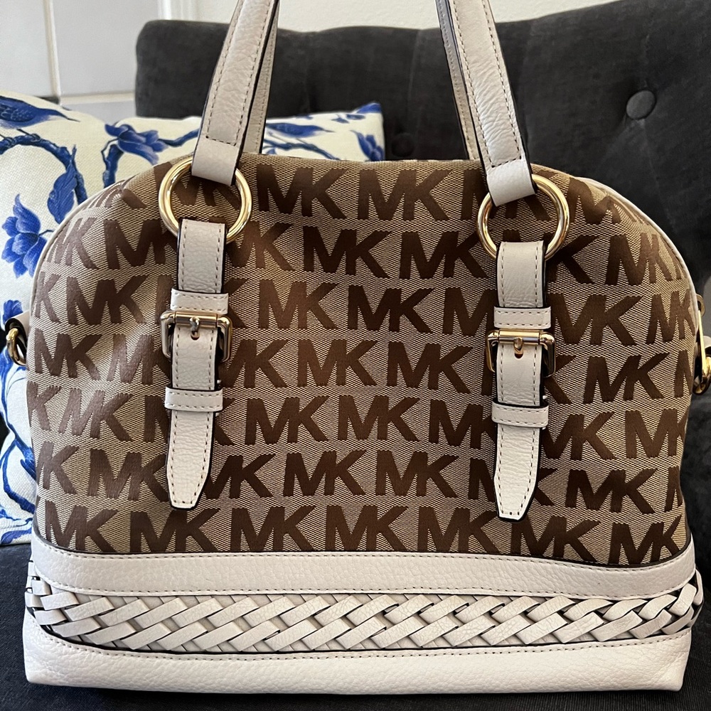 Michael Kors canvas and pebble grain leather satchel.